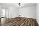 Spacious living area featuring wood-look floors and a ceiling fan at 161 Peacock, Altamonte Springs, FL 32701