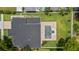Stunning aerial view of a private backyard with a luxurious pool and pristine landscaping at 1620 S Eola Dr, Orlando, FL 32806