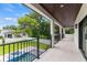 Covered balcony overlooking the pool, with dark wood ceiling and ample space at 1620 S Eola Dr, Orlando, FL 32806