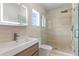 Modern bathroom featuring glass shower, modern vanity, and neutral color scheme at 1620 S Eola Dr, Orlando, FL 32806