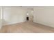 A spacious bedroom with light hardwood floors and plenty of natural light at 1620 S Eola Dr, Orlando, FL 32806