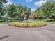 Park with lush greenery and a decorative fountain creating a peaceful atmosphere for residents at 1620 S Eola Dr, Orlando, FL 32806