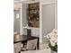 Dining area featuring a stylish bar with wine storage and a modern chandelier at 1620 S Eola Dr, Orlando, FL 32806