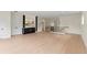 Spacious upstairs living area featuring light wood floors, a wet bar, and stylish modern design at 1620 S Eola Dr, Orlando, FL 32806