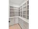 Well-organized pantry with custom shelving and drawer storage at 1620 S Eola Dr, Orlando, FL 32806