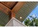 Detailed view of a porch featuring a wood beam, brick column, and a view of the sky at 1620 S Eola Dr, Orlando, FL 32806