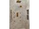 Close up of large shower featuring rainforest shower head, and beautiful designer tiles at 1620 S Eola Dr, Orlando, FL 32806