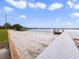 Residents' private community beach and pier for a scenic lakeside retreat at 223 Royal Oaks Cir, Longwood, FL 32779