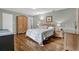 Bedroom with hardwood floors and ensuite furniture at 223 Royal Oaks Cir, Longwood, FL 32779