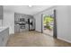 This kitchen features stainless steel appliances, grey cabinetry, and tile flooring at 223 Royal Oaks Cir, Longwood, FL 32779