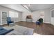 Living room with hardwood floors and built-in shelving at 223 Royal Oaks Cir, Longwood, FL 32779