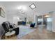 Bright living room with skylight and sliding glass doors at 223 Royal Oaks Cir, Longwood, FL 32779