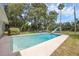 Backyard pool area featuring comfortable seating, and a fun pool slide at 223 Royal Oaks Cir, Longwood, FL 32779