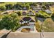Aerial view of home showcasing a well-maintained lawn, long driveway, and mature landscaping, offering great curb appeal at 2446 Greenway, Sanford, FL 32771