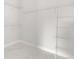 Walk-in closet with white marble floors and metal shelving units at 2446 Greenway, Sanford, FL 32771