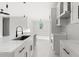 Modern kitchen featuring stainless steel appliances, island with counter seating and marble floors at 2446 Greenway, Sanford, FL 32771