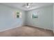 A quaint bedroom illuminated by windows, complete with plush carpeting at 247 Carmen Ln, Debary, FL 32713