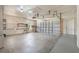 An expansive garage with ample storage and workspace potential at 247 Carmen Ln, Debary, FL 32713