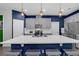 Well-appointed kitchen with a large island, stainless steel appliances, and ample counter space at 2829 Red Alder Blvd, Ocoee, FL 34761