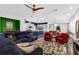 Open-concept living room featuring modern decor, a dining area, and stylish accents at 2829 Red Alder Blvd, Ocoee, FL 34761