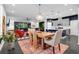 Open-concept home featuring a living room, dining area, and modern kitchen at 2829 Red Alder Blvd, Ocoee, FL 34761