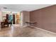 Open-concept living and dining area with tile flooring and access to kitchen and backyard at 2843 Grove Dr, Sanford, FL 32773