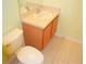 Bright bathroom featuring a single sink vanity with a mirror and tile flooring at 3321 Wilshire Way Rd # 6, Orlando, FL 32829