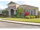 Elegant community clubhouse featuring well-maintained landscaping and ample parking at 3321 Wilshire Way Rd # 6, Orlando, FL 32829