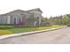 Upscale community clubhouse featuring meticulously manicured landscaping and plenty of parking at 3321 Wilshire Way Rd # 6, Orlando, FL 32829