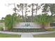 Victoria Pines community entrance with decorative signage, landscaping, and elegant pillars at 3321 Wilshire Way Rd # 6, Orlando, FL 32829