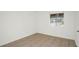 Bedroom features tile floors and window allowing for abundant natural light at 4403 S Semoran Blvd # 3, Orlando, FL 32822