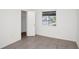 Bedroom featuring tile floors, natural light from the window and a closet at 4403 S Semoran Blvd # 3, Orlando, FL 32822