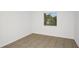 Bright bedroom featuring tile floors and a window letting in natural light at 4403 S Semoran Blvd # 3, Orlando, FL 32822