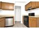 Kitchen with stainless dishwasher and modern oven at 4403 S Semoran Blvd # 3, Orlando, FL 32822