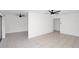 Spacious living room featuring tile floors and ceiling fan at 4403 S Semoran Blvd # 3, Orlando, FL 32822