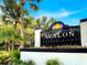 Community sign for Avalon Condominiums surrounded by lush greenery at 4403 S Semoran Blvd # 3, Orlando, FL 32822