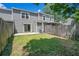 This fenced backyard features a well-maintained lawn at 4443 Brook Hollow Cir # 19A, Winter Springs, FL 32708