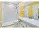 This renovated bathroom features a new shower with a stylish tile surround at 4443 Brook Hollow Cir # 19A, Winter Springs, FL 32708