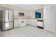 Well-equipped kitchen with stainless steel refrigerator and ample cabinet space at 4443 Brook Hollow Cir # 19A, Winter Springs, FL 32708