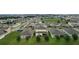 Aerial view of a community with well-maintained lawns and various home styles at 565 Ogelthorpe Dr, Davenport, FL 33897