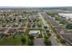 Aerial view of neighborhood featuring community pool at 565 Ogelthorpe Dr, Davenport, FL 33897