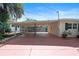 Large carport featuring a concrete floor, a wooden fence, and room for vehicles, boats, or recreational equipment at 600 Sheridan Blvd, Orlando, FL 32804