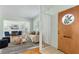 Cozy living room featuring hardwood floors, fireplace, modern decor, and an inviting open layout with ample natural light at 600 Sheridan Blvd, Orlando, FL 32804