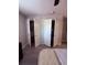 Spacious bedroom closet with bi-fold doors and ample storage space for clothes and personal items at 6013 Scotchwood Gln # 20, Orlando, FL 32822