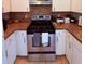 Well-equipped kitchen with stainless steel appliances and ample counter space at 6013 Scotchwood Gln # 20, Orlando, FL 32822