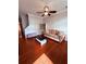 Comfortable living room boasts hardwood floors, modern furniture, and natural light at 6013 Scotchwood Gln # 20, Orlando, FL 32822