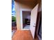 View into the storage area from the patio, showcasing additional storage solutions at 6013 Scotchwood Gln # 20, Orlando, FL 32822