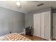 Bedroom showcasing a ceiling fan, closet, and wood-look floors at 607 Green Briar Blvd, Altamonte Springs, FL 32714