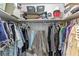 Organized walk-in closet featuring clothing racks and shelving at 607 Green Briar Blvd, Altamonte Springs, FL 32714