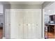 Spacious closet with folding doors offers ample storage in the hallway at 607 Green Briar Blvd, Altamonte Springs, FL 32714